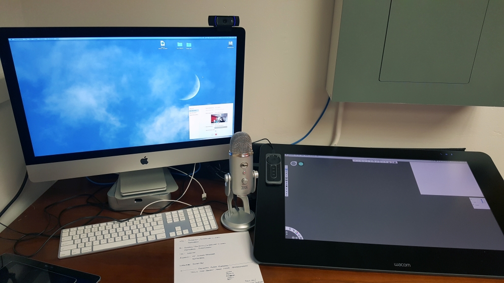 An image of a workstation with a Cintiq screen set up to record screen annotations.