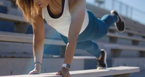 A woman in the pushup position